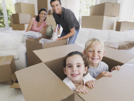 Professional movers loading furniture for a same day move