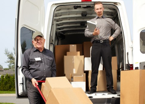 Professional house removalists in Brompton loading furniture into a moving truck