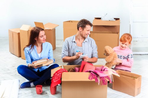 Apartment removals in Brompton with furniture being carried