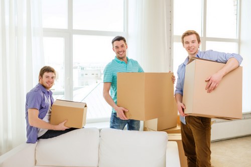 Movers handling furniture with care and coordination