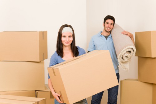 Local moving team handling furniture near Brompton streets