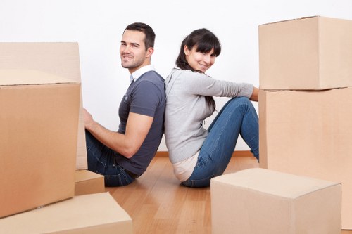 Household moving team working in a Brompton apartment building