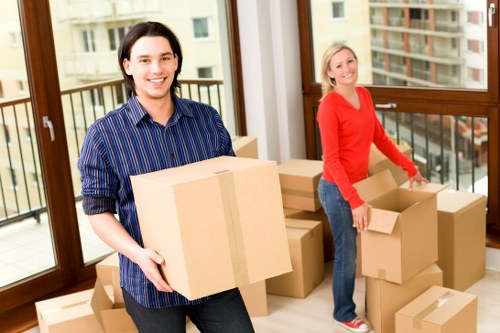 Professional removals service in Brompton handling packed boxes